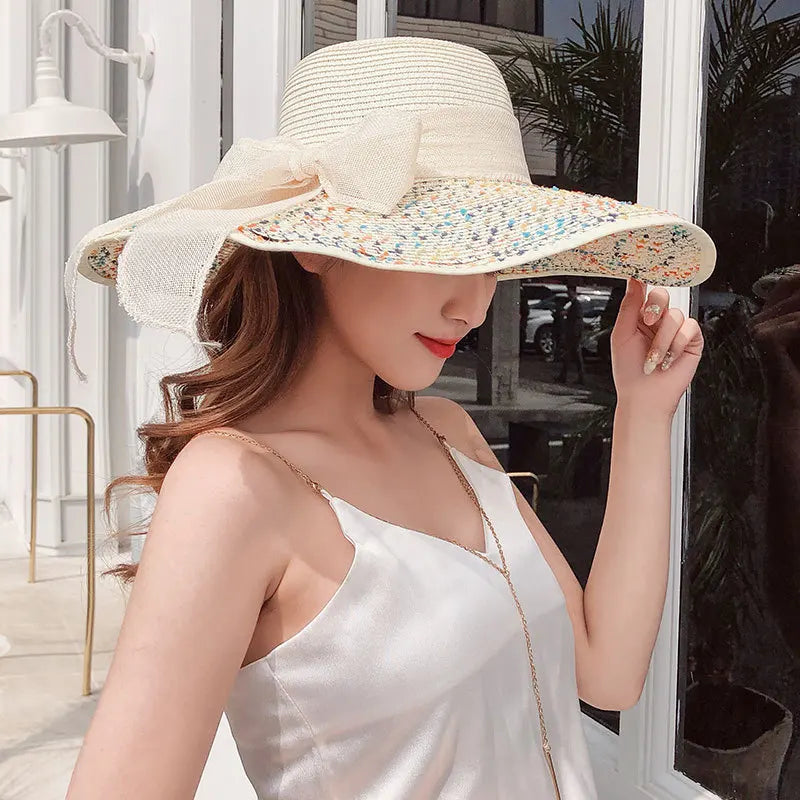 Chapeau de paille d'été femme style coréen avec large bord, pliable et anti-UV

